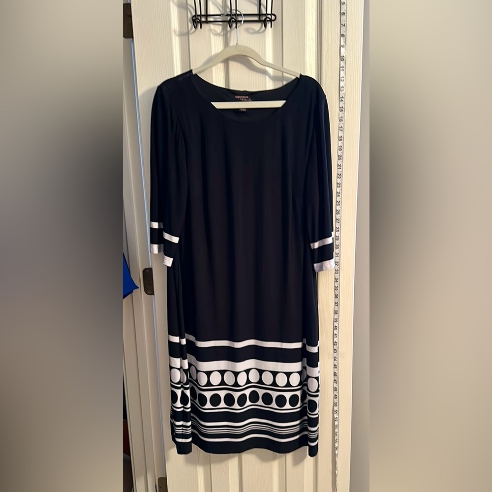 Cute black-and-white dress with three-quarter length sleeves